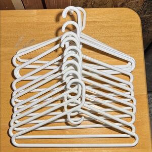 Set of 12 White Plastic Hangers